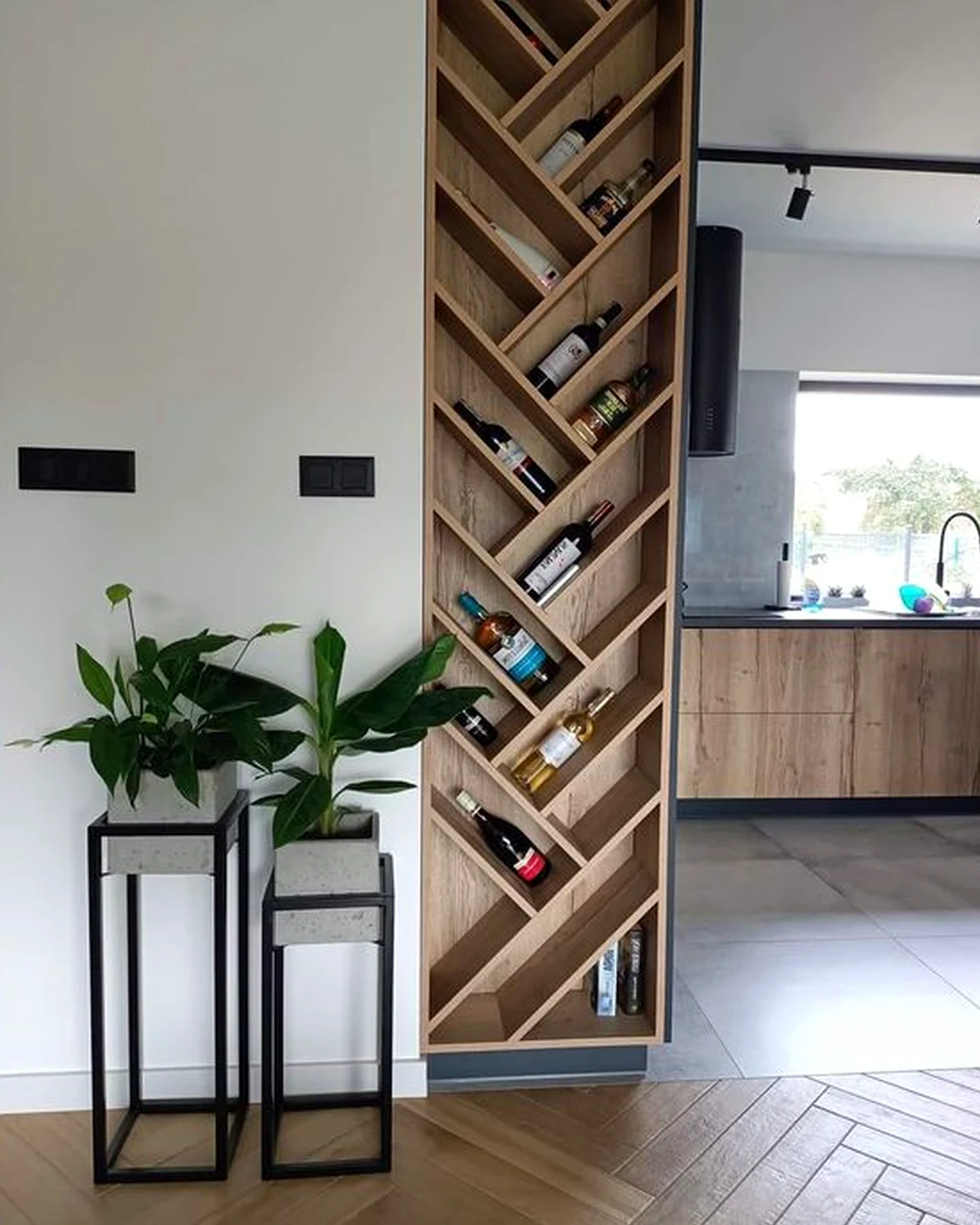 Airy stair landing draws attention to order while the wall stays easy to enjoy.