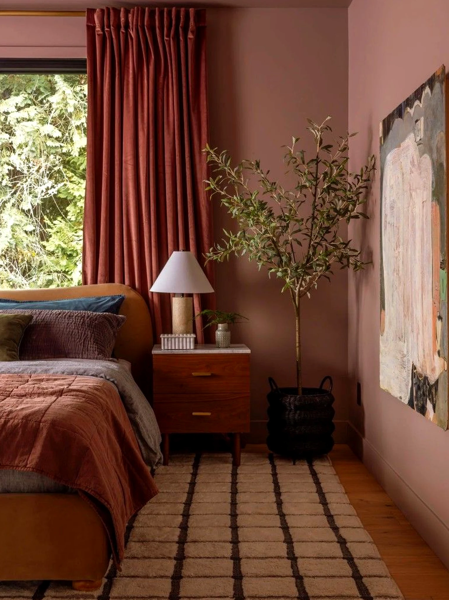 Calm courtyard view frames the composition with shape, making the scene feel simple yet expressive.