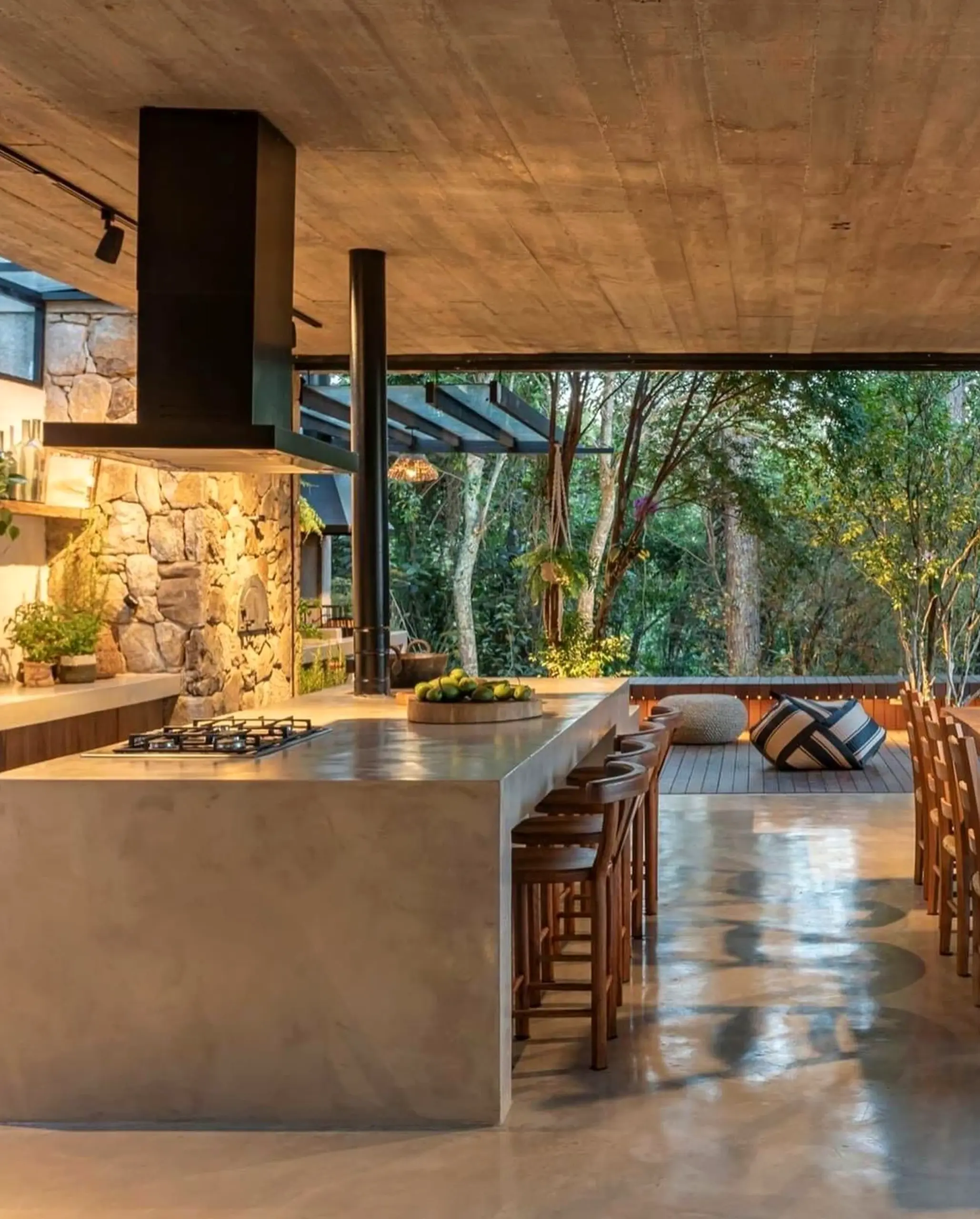 Relaxed green entry supports the outdoor space through balance, leaving the space feeling settled and welcoming.