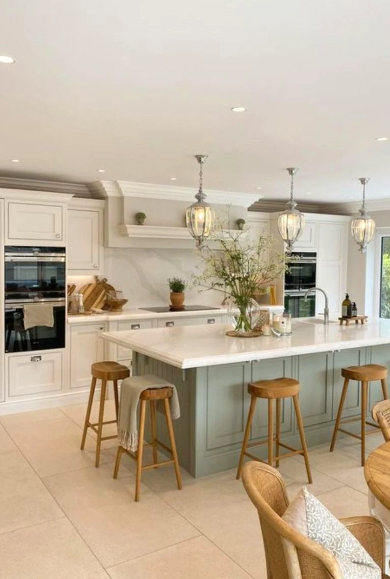 Warm cabinet wall brings focus to the outdoor space, creating a mood that feels fresh and intentional.