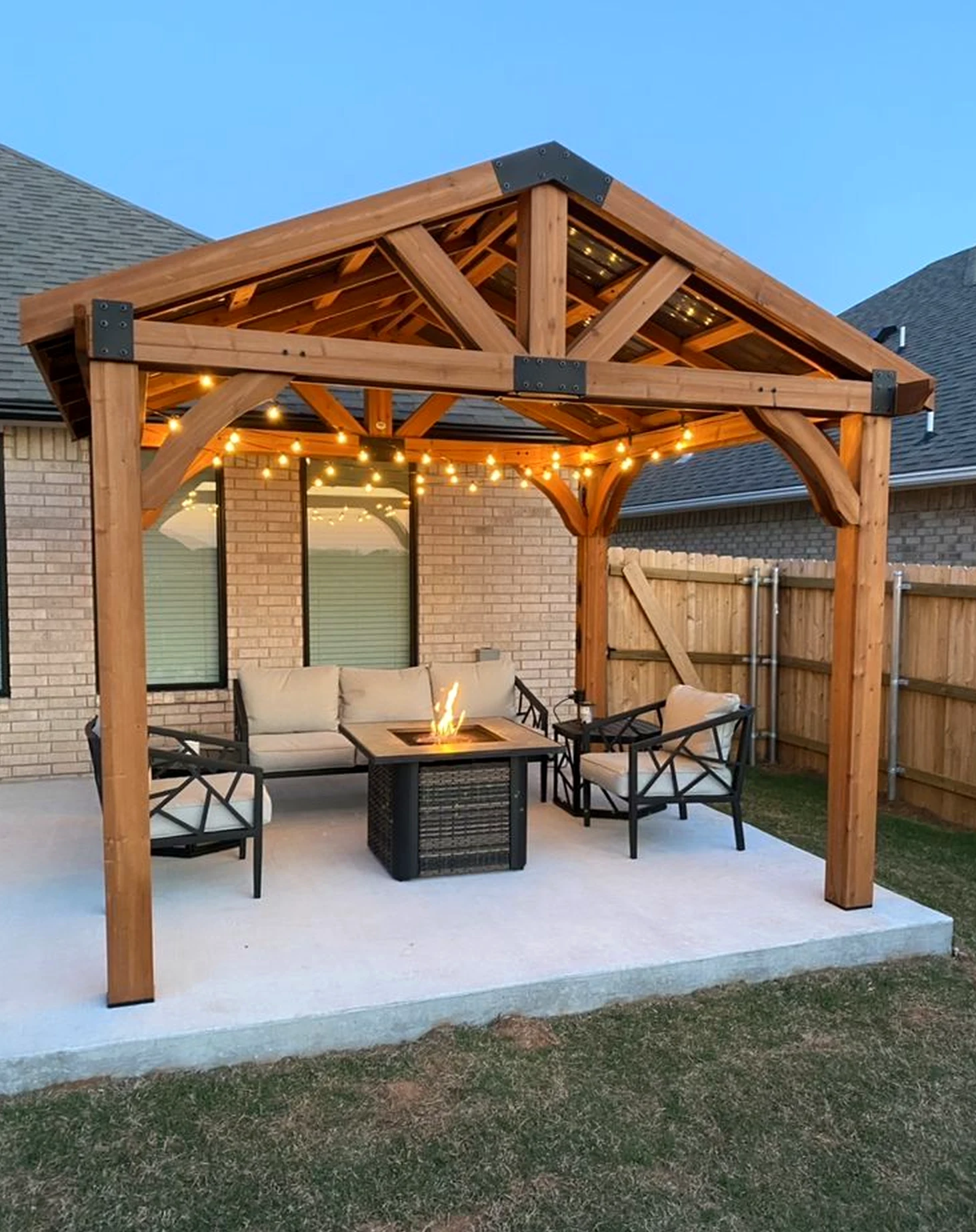 Elegant wood shelving adds a clear layer of light, helping the outdoor space feel fresh and intentional.