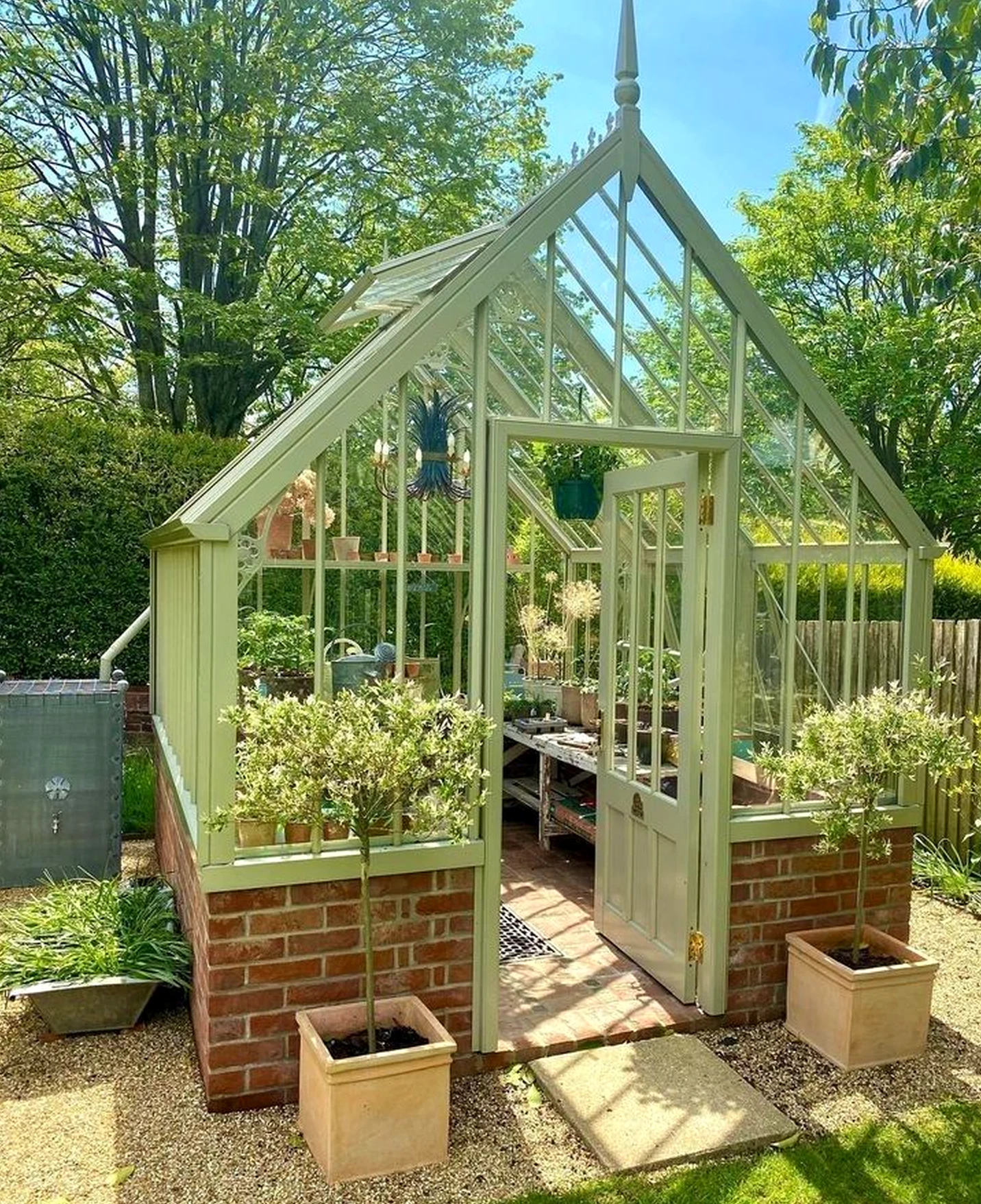 Polished garden border frames the setting with comfort, making the scene feel clear and inviting.