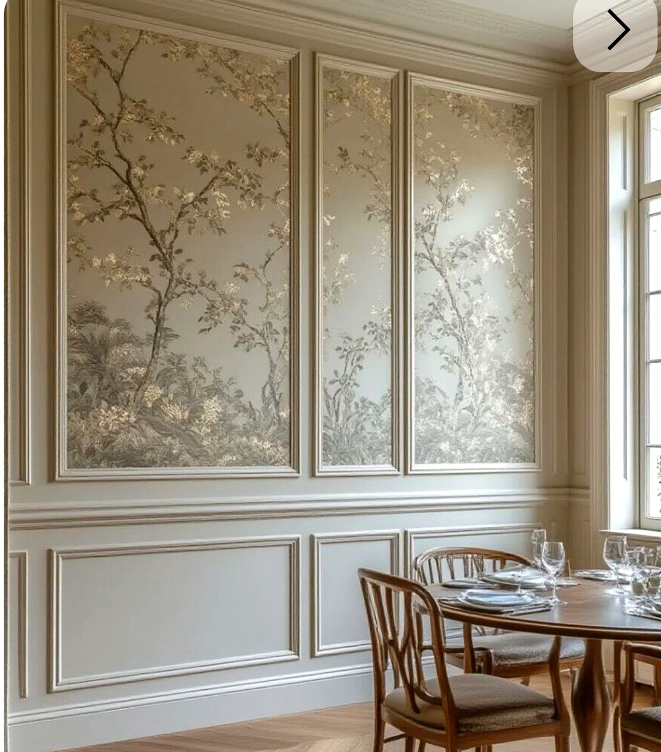 Leafy wood shelving brings a useful note of rhythm, making the setting feel quietly finished.