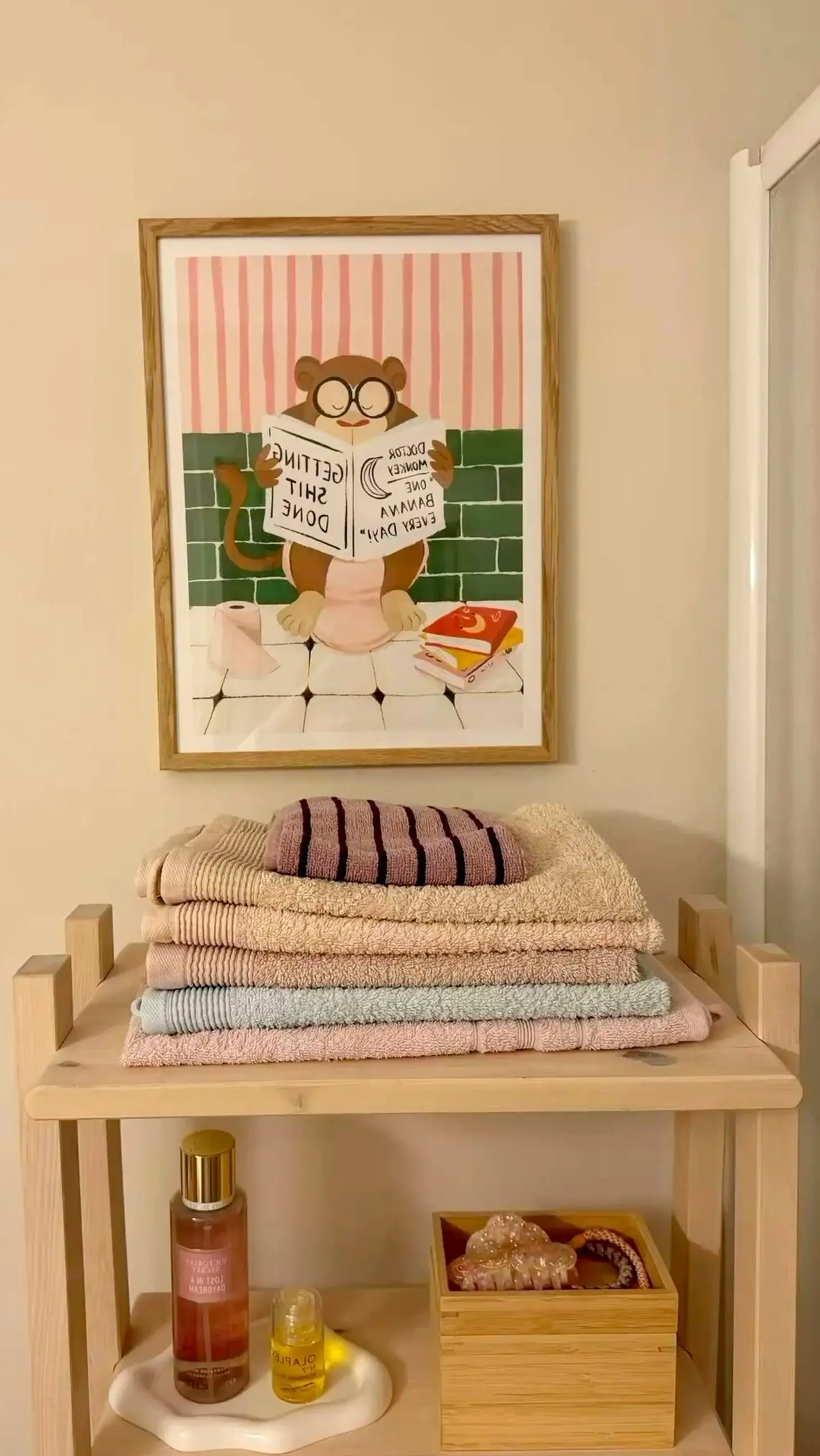 Soft neutral bedroom frames the wall with light, making the scene feel pleasantly composed.